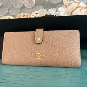 Brand new Coach “Slim Wallet” with snap closure